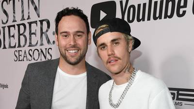 Scott 'Scooter' Braun with Justin Bieber. Getty Images