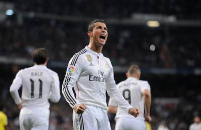 Cristiano Ronaldo of Real Madrid celebrates after scoring his team's opening goal during the Primera Liga match against Villarreal at Estadio Santiago Bernabeu on March 1, 2015 in Madrid, Spain. Denis Doyle / Getty Images
