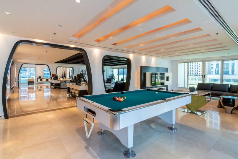 A space built for entertaining, complete with a billiards table. Courtesy Allsopp & Allsopp