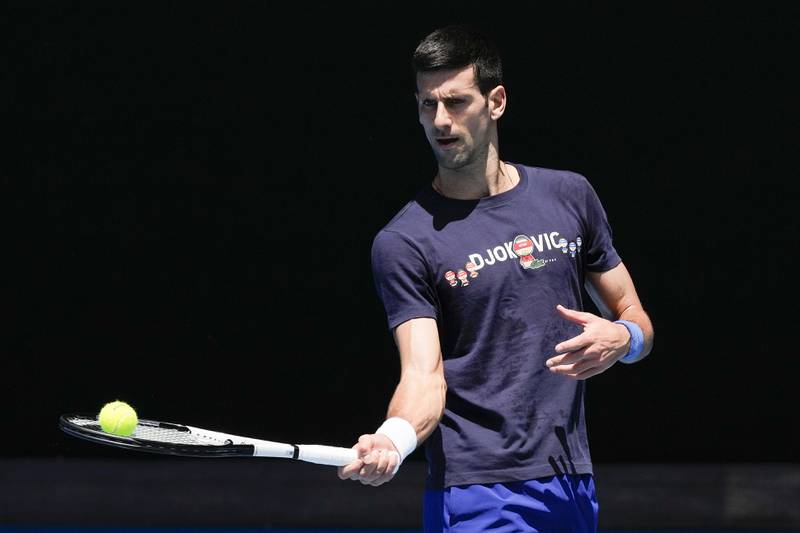 Defending men's champion Serbia's Novak Djokovic practices on Rod Laver Arena ahead of the Australian Open, which begins on January 12. AP Photo