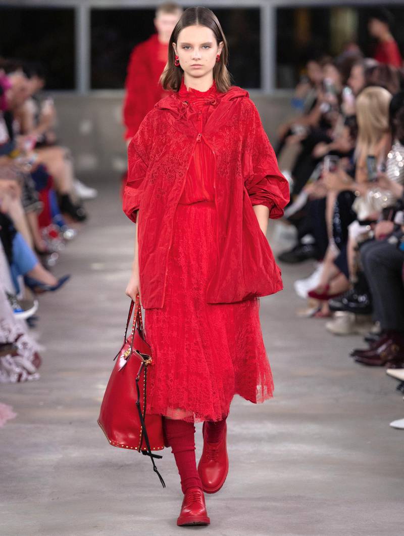 The house shade of fiery Valentino red, was worn head to toe, right down to the accessories