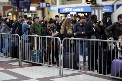 An industrial dispute involving workers at UK airports could affect travellers who fly with Etihad and Emirates. Matt Dunham / AP Photo
