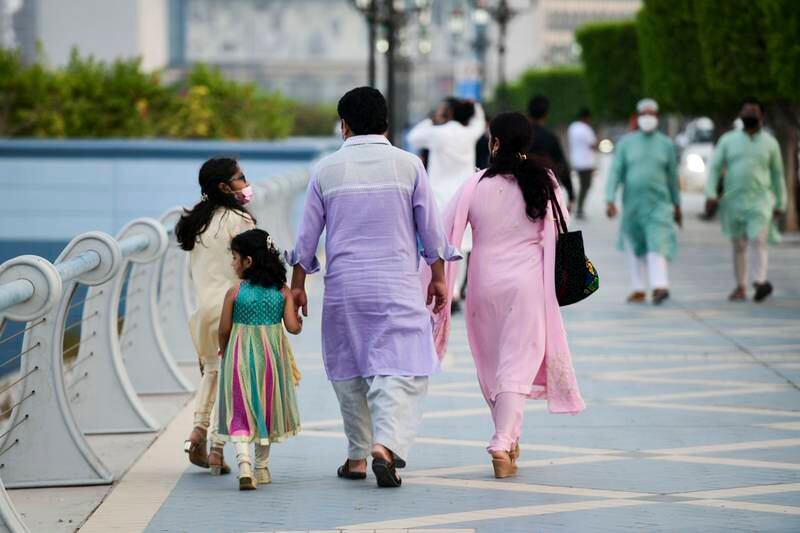 Families spend quality time on the Corniche in Abu Dhabi. The UAE's new legal procedures provide residents with an accessible civil legal framework. Khushnum Bhandari / The National