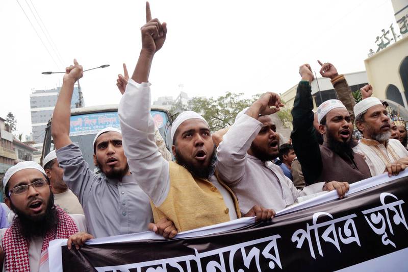 Leaders and supporters of Bangladeshi Islamic organisations protest in front of the national mosque in Dhaka on December 8, 2017 against US president Donald Trump's decision to recognise Jerusalem as the capital of Israel. Abir Abdullah / EPA