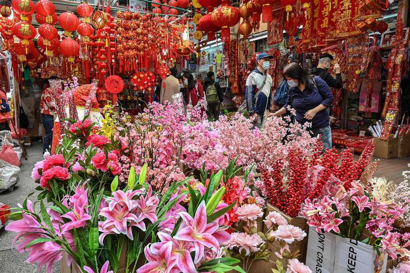 People shop for decorations ahead of the Lunar New Year in Hong Kong.  AFP