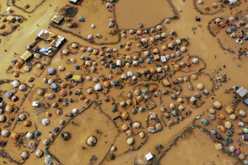 Huts made of branches and cloth provide shelter to Somalis displaced by drought on the outskirts of Dollow, Somalia.   AP Photo