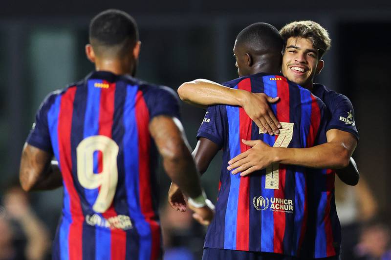 Ousmane Dembele celebrates with Abde Ezzalzouli after scoring Barcelona's sixth goal against Inter Miami. Getty
