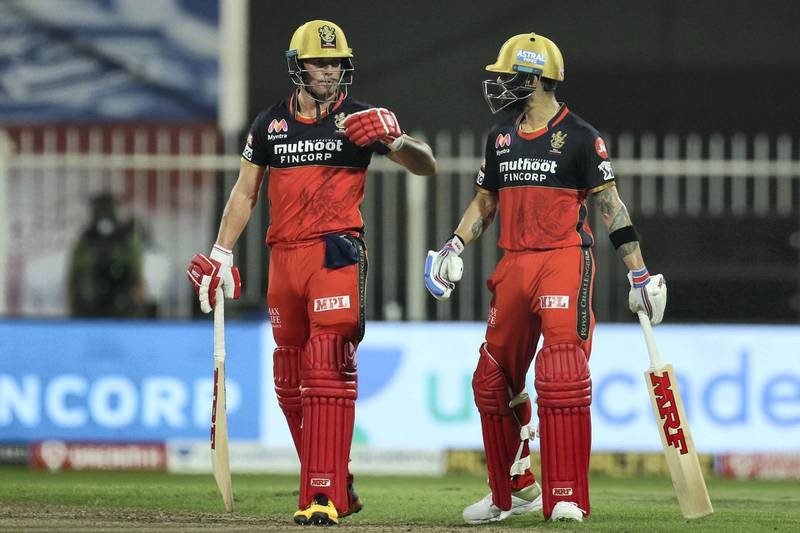 AB de Villiers of Royal Challengers Bangalore and Virat Kohli captain of Royal Challengers Bangalore during match 28 of season 13 of the Dream 11 Indian Premier League (IPL) between the Royal Challengers Bangalore and the Kolkata Knight Riders held at the Sharjah Cricket Stadium, Sharjah in the United Arab Emirates on the 12th October 2020.  Photo by: Deepak Malik  / Sportzpics for BCCI