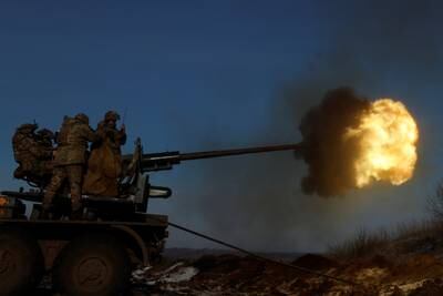 Ukrainian forces fire an anti-aircraft weapon as Russia's attack on the frontline city of Bakhmut continues. Reuters