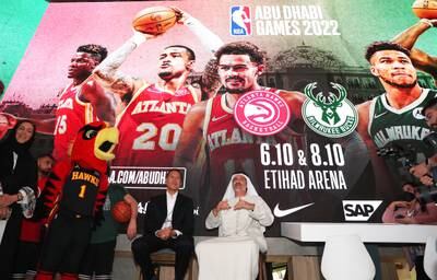 Ralph Rivera, managing director of NBA Europe and Middle East, seated, left, and Saleh Mohamed Al Geziry, director general for Tourism at DCT Abu Dhabi during the press conference for NBA Abu Dhabi Games 2022, at Arabian Travel Market, held at Dubai World Trade Centre in Dubai. All photos: Pawan Singh / The National