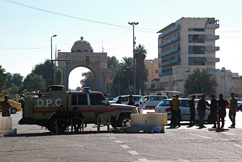 Iraqi Security forces close the heavily fortified Green Zone as they tightened security measures hours after the assassination attempt on the prime minister in Baghdad on November 7. AP