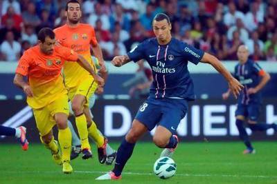With the first leg tied 2-2, the stage is set for Zlatan Ibrahimovic, right, to shine at Camp Nou. Bertrand Langlois / AFP