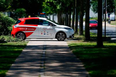 (FILES) In this file photograph taken on June 26, 2018, an autonomous car drives past during a press presentation in the north-western French city of Sotteville-lès-Rouen, near Rouen.   In the not-too-distant future, driverless cars may have to choose between saving their passengers or pedestrians when faced with unavoidable accidents. But how should they decide?. It's one of the thorniest issues faced by policymakers and manufacturers as we edge closer to a future where autonomous vehicles fill our roads, and a new study offers some potential principles based on a survey of millions of people. / AFP / CHARLY TRIBALLEAU
