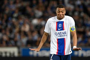 (FILES) Paris Saint-Germain's French forward Kylian Mbappe reacts during the French L1 football match between RC Strasbourg Alsace and Paris Saint-Germain (PSG) at Stade de la Meinau in Strasbourg, eastern France on May 27, 2023.  French superstar Kylian Mbappe was reinstated in Paris Saint-Germain's first team on August 13, 2023 after being sidelined for several weeks amid an ongoing contract dispute.  (Photo by Jean-Christophe Verhaegen  /  AFP)