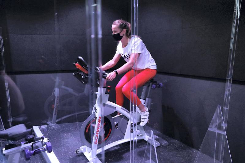 Dubai, United Arab Emirates - Reporter: N/A: News. Covid-19/Coronavirus. Maria works out. Crank an Indoor Cycling & Boutique Fitness Studio have brought in partitions between bikes to protect their customers from Covid-19. Monday, June 1st, 2020. Dubai. Chris Whiteoak / The National