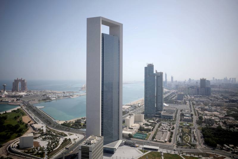 Adnoc's headquarters in Abu Dhabi. The energy company will sell more than three billion shares in subsidiary Adnoc Gas. Reuters