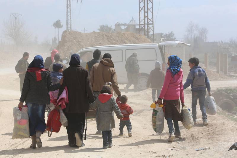 More than 20,000 people have fled Hamouria and nearby areas in the Eastern Ghouta region since government forces captured the town, according to activists. AFP