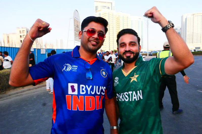 Fans of India and Pakistan's cricket teams together before their Asia Cup 2022 match. Pawan Singh / The National