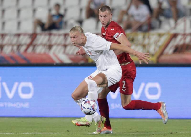 Norway's Erling Haaland (L) in action against Serbia's Strahinja Pavlovic (R) during the UEFA Nations League soccer match between Serbia and Norway in Belgrade, Serbia, 02 June 2022.   EPA / ANDREJ CUKIC
