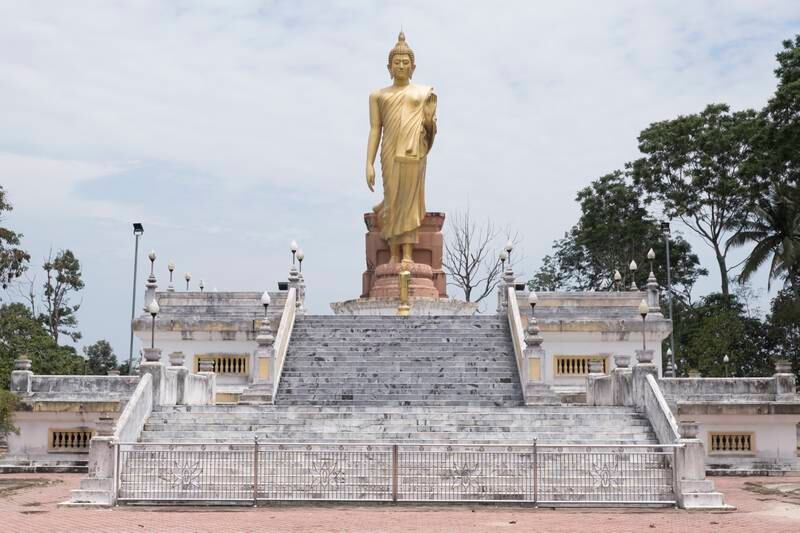 A Buddha statue at a Thai temple near Tumpat