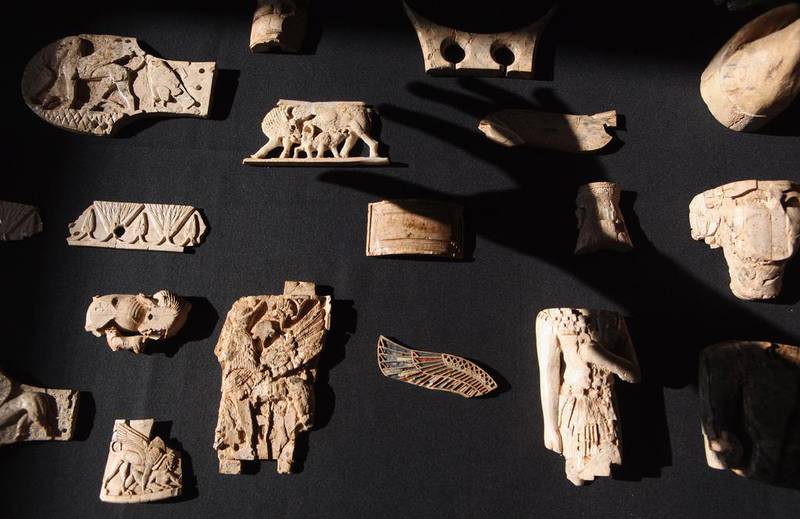 Winged bulls, steles, cuneiform tablets and more from long-vanished cities like Nimrud, Babylon and Urare on display at the British Museum in London. Oli Scarff / Getty Images