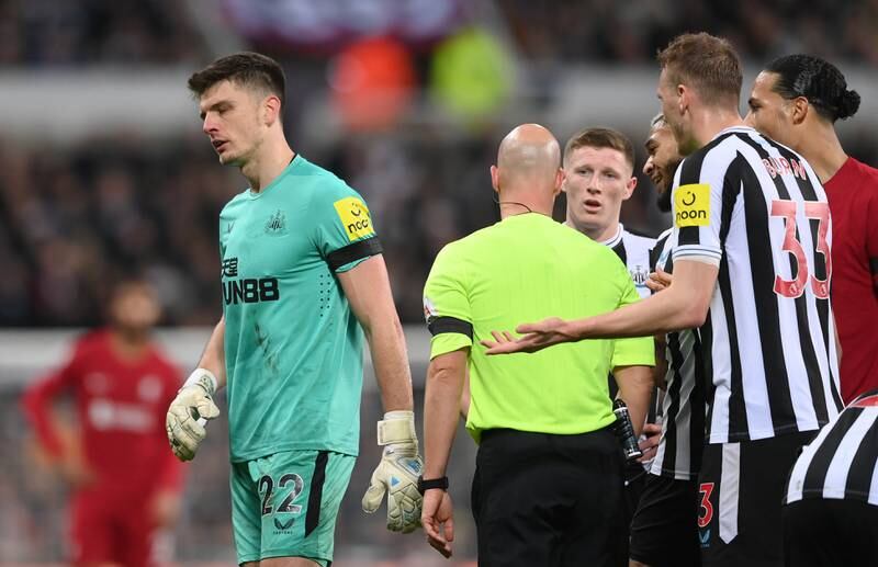 Newcstle goalkeeper Nick Pope is shown a red card against Liverpool, meaning he will miss the League Cup final on February 26. Getty Images