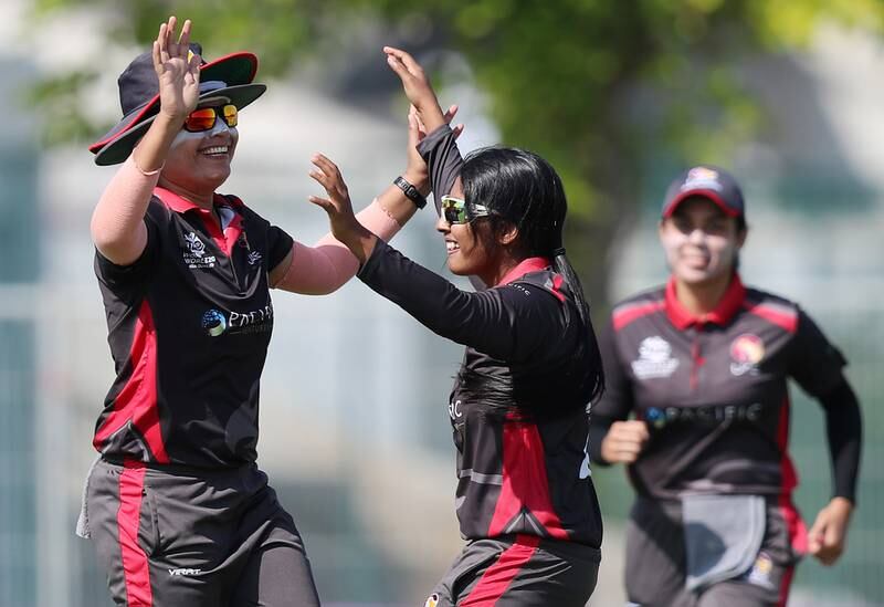 UAE's Kavisha Egodage celebrates taking the wicket of Malaysia's Winifred Duraisingam in their Women's T20 World Cup Asia region qualifier at the ICC Academy in Dubai. All images Chris Whiteoak / The National