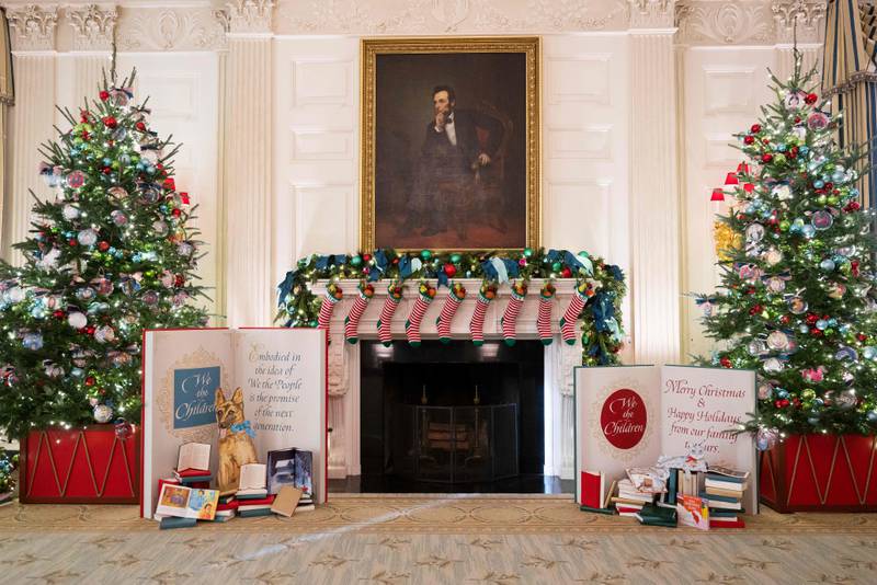 Commander guards the Biden family stockings in the State Dining Room. AFP
