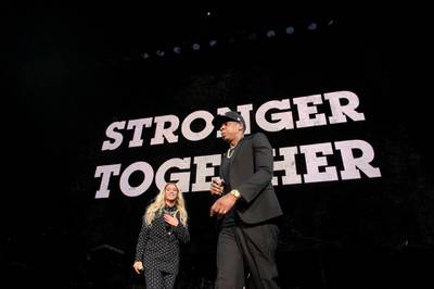 (FILES) In this file photo taken on November 4, 2016 Beyonce (L) and Jay-Z introduce Democratic presidential nominee Hillary Clinton during a Get Out the Vote (GOTV) performance in support of her at the Wolstein Center in Cleveland, Ohio. Music's most famous couple Beyonce and Jay-Z pulled a surprise by releasing a joint album late on June 16, 2018, a long-rumored collaboration that celebrates their marital passion. / AFP / Brendan Smialowski
