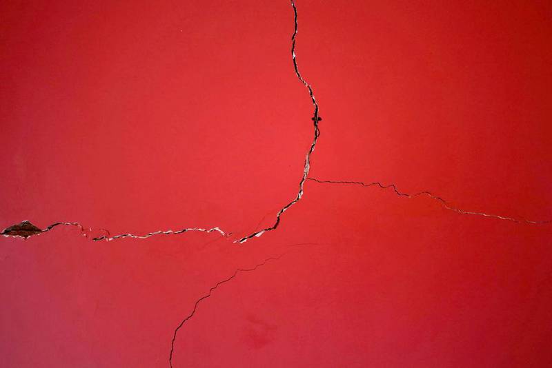 Cracks are seen in a wall in Al Assal. Amr Abdallah Dalsh/Reuters