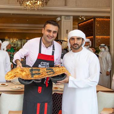 Turkish chef Burak Ozdemir with Sheikh Hamdan at his restaurant, Czn Burak Dubai. 