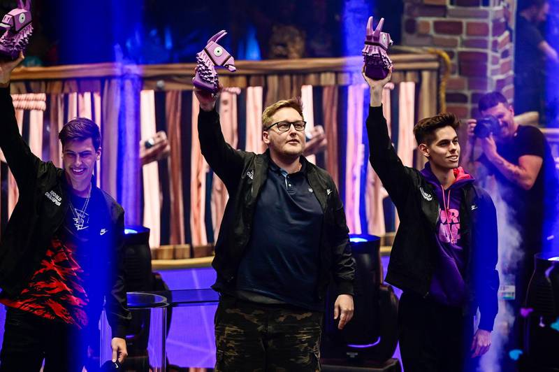Cizzorz, Zand and Tyler of Fortnite team Fish Fam celebrate after winning the Fortnite World Cup Creative during the Fortnite World Cup Finals e-sports event at Arthur Ashe Stadium. USA TODAY Sports
