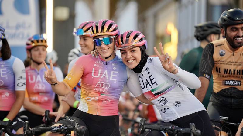 UAE Team ADQ riders Linda Zenatti, from Switzerland, left, and Safiya Al Sayegh share a light-hearted moment. Photo: UAE Team ADQ