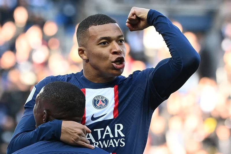 Paris Saint-Germain forward Kylian Mbappe celebrates after scoring the first goal in the 5-0 Ligue 1 victory against Auxerre at the Parc des Princes on November 13, 2022.  AFP