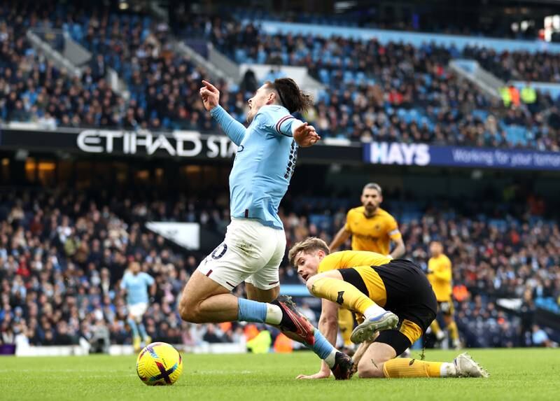 City's Jack Grealish goes down in the box under the challenged of Wolves' Nathan Collins but no penalty was given. Getty