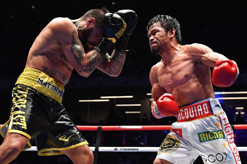 Manny Pacquiao throws a punch towards Lucas Matthysse. AFP