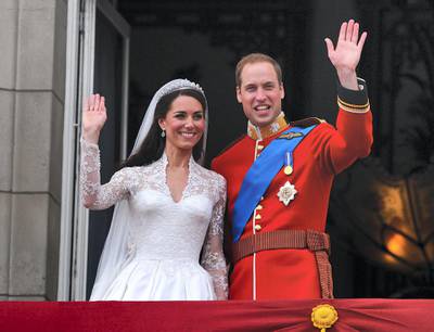 LONDON, ENGLAND - APRIL 29: Their Royal Highnesses Prince William, Duke of Cambridge and Catherine, Duchess of Cambridge wave on the balcony at Buckingham Palace during the Royal Wedding of Prince William to Catherine Middleton on April 29, 2011 in London, England. The marriage of the second in line to the British throne was led by the Archbishop of Canterbury and was attended by 1900 guests, including foreign Royal family members and heads of state. Thousands of well-wishers from around the world have also flocked to London to witness the spectacle and pageantry of the Royal Wedding. (Photo by John Stillwell-WPA Pool/Getty Images)