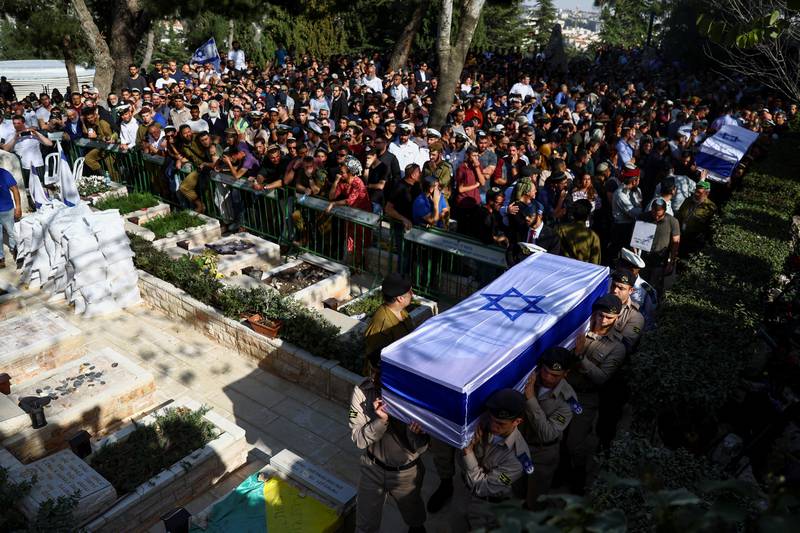 The funeral of two Israeli brothers is held in Jerusalem after they were killed by a suspected Palestinian gunman. Reuters