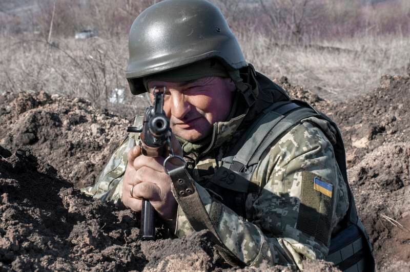 A Ukrainian soldier near Kharkiv. EPA