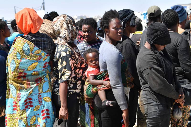 Migrants disembark in Tunisia after being intercepted on a boat en route to Europe. AFP 