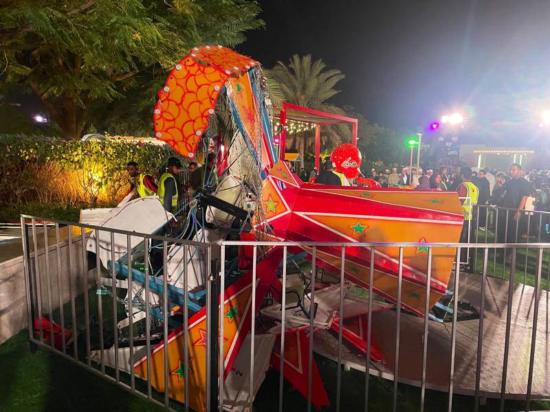 The carousel ride on its side after collapsing. Photo: Oman Civil Defence and Ambulance Authority