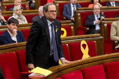 epaselect epa06731502 Catalan pro-independence party Junts Per Catalunya (JxCat)`s MP Quim Torra, new candidate for Catalan regional President, after the plenary session at Catalan Regional Parliament in Barcelona, Spain, 12 May 2018. Catalan regional Parliament held a plenary session to debate and voting of the investiture of Torra as new regional President. The investiture was rejected and Torra had to wait a second vote will be held on next 14 May when he would only need a simple majority to become in President.  EPA/Quique Garcia