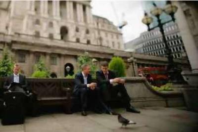 LONDON - SEPTEMBER 02:   (EDITOR'S NOTE: A TILT AND SHIFT LENS WAS USED IN THE CREATION OF THIS IMAGE) City workers sit in front of the Bank of England on September 2, 2008 in central London, England. The Paris-based Organisation for Economic Cooperation and Development (OECD) has predicted that the UK economy will fall into recession during the second half of this year.  (Photo by Daniel Berehulak/Getty Images) *** Local Caption ***  GYI0055607156.jpg