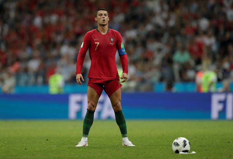 With a couple of minutes to play Portugal are awarded a free kick, Cristiano Ronaldo prepares to take it. Ueslei Marcelino / Reuters