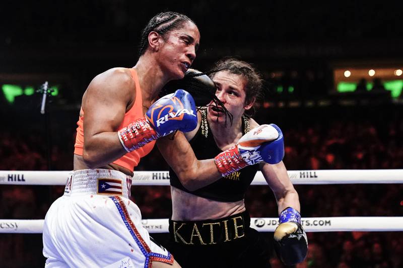 Katie Taylor punches Amanda Serrano during the sixth round. AP