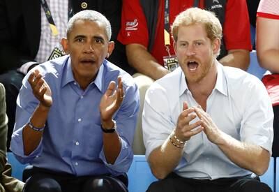 Britain's Prince Harry (R) and former U.S. President Barack Obama watch a wheelchair basketball event during the Invictus Games in Toronto, Ontario, Canada September 29, 2017.    REUTERS/Mark Blinch     TPX IMAGES OF THE DAY