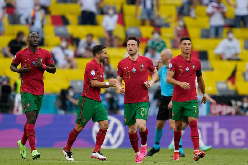 Portugal's Diogo Jota (2R) after netting their second. EPA