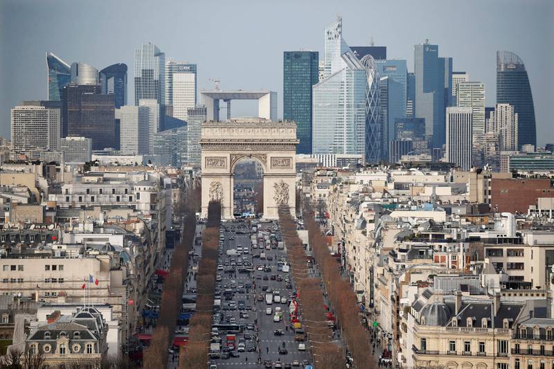 FILE PHOTO: General view of the skyline of La Defense business district with its Arche behind Paris' landmark, the Arc de Triomphe and the Champs Elysees Avenue in Paris, France, January 13, 2016.  REUTERS/Charles Platiau/File Photo