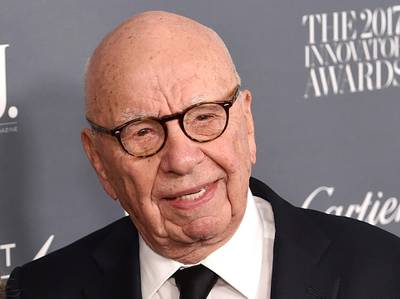 FILE - In this Wednesday, Nov. 1, 2017, file photo, Fox News chairman and CEO Rupert Murdoch attends the WSJ. Magazine 2017 Innovator Awards at The Museum of Modern Art in New York. Murdoch has told senior managers at 21st Century Fox that he will be working from home for a few weeks after a recent back injury in a sailing accident. (Photo by Evan Agostini/Invision/AP, File)