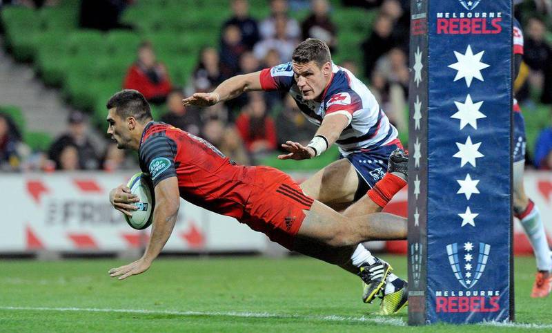 Damian de Allende of the Stormers dives to score a try against the Melbourne Rebels on Saturday in Super Rugby. Joe Castro / EPA / July 2, 2016 